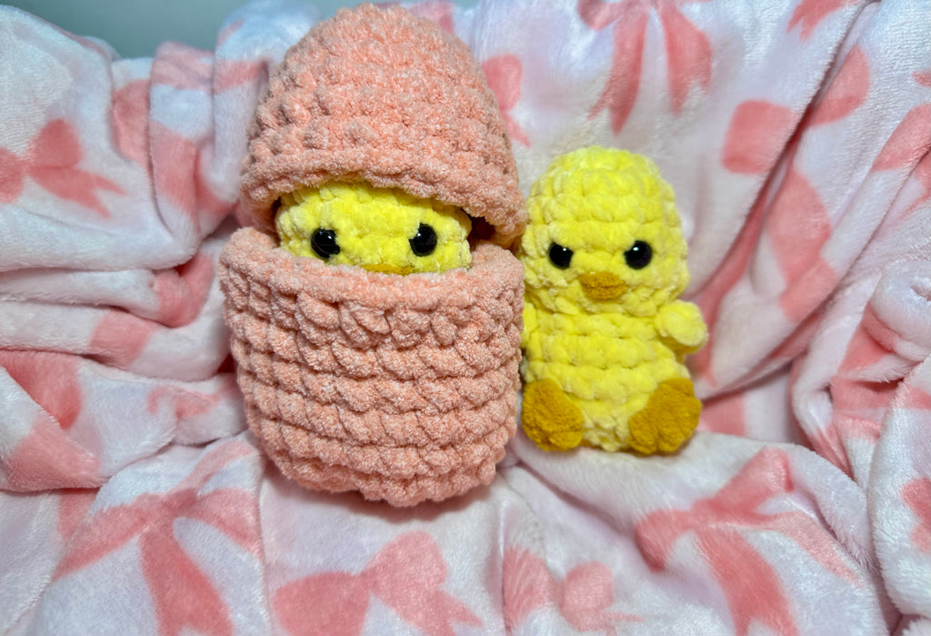 The Hutch Chicks — Pip in peach basket with Sunny beside