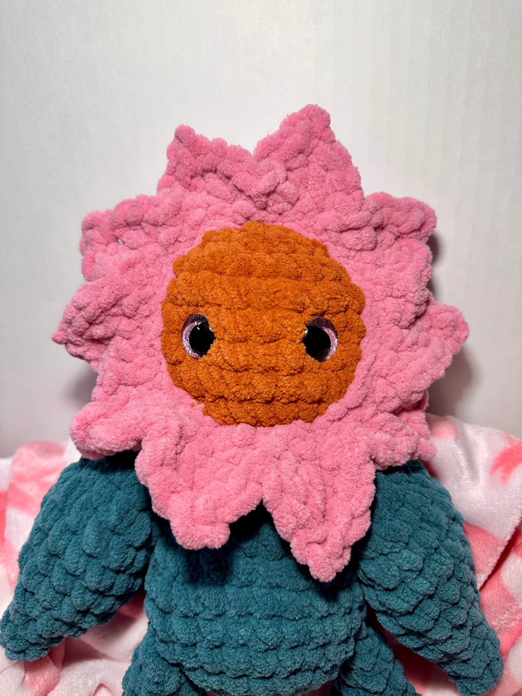 Rosie the Sunflower — close-up of caramel center and pink petal crown
