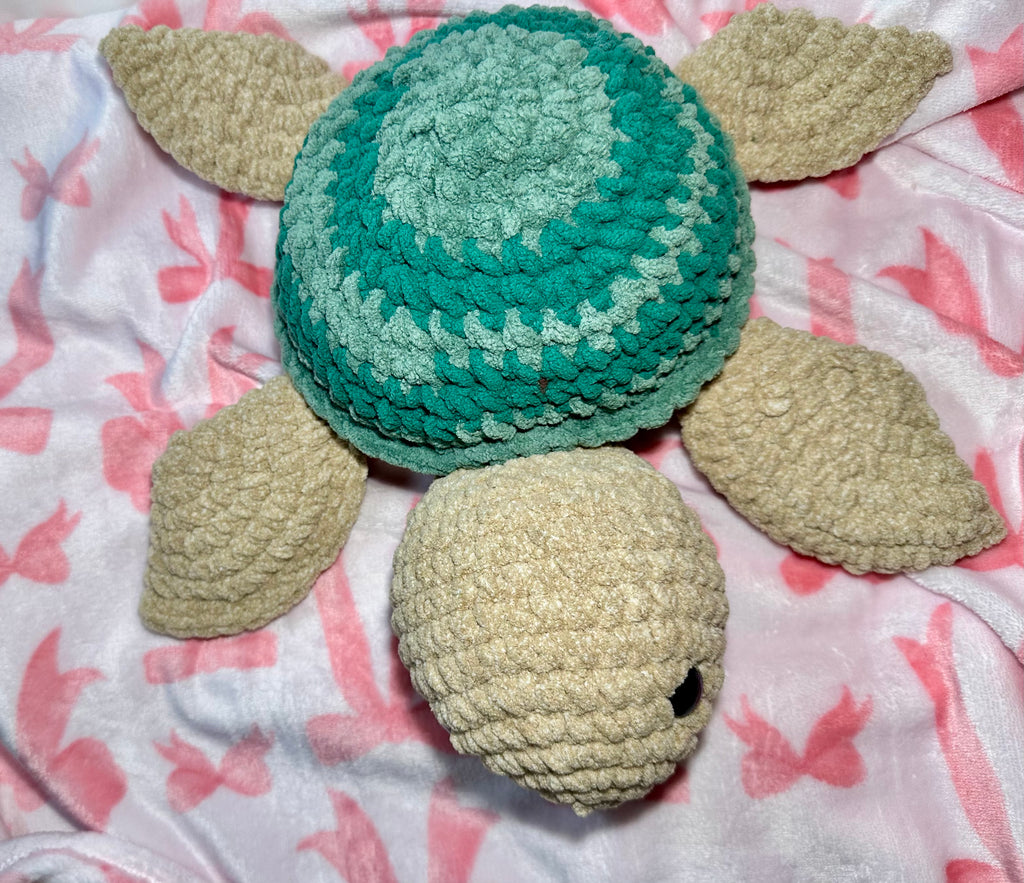 Greeny the Sea Turtle — handmade crochet sea turtle with two-tone teal shell, top view